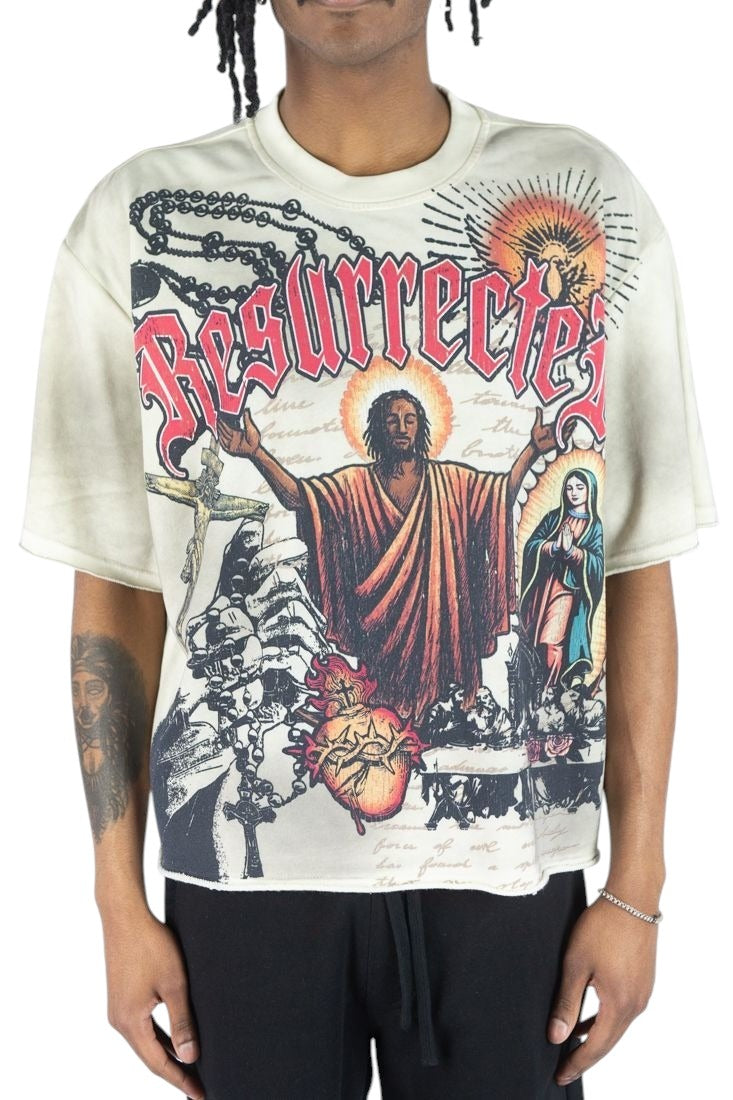 On Time Fashions Rebel Minds Jesus Relic heavyweight French terry tee with graphic print on cream fabric.