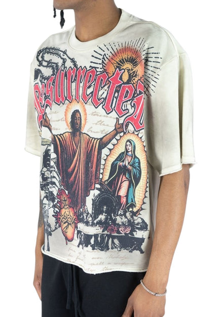 On Time Fashions Rebel Minds Jesus Relic heavyweight French terry graphic tee in cream with religious artwork.
