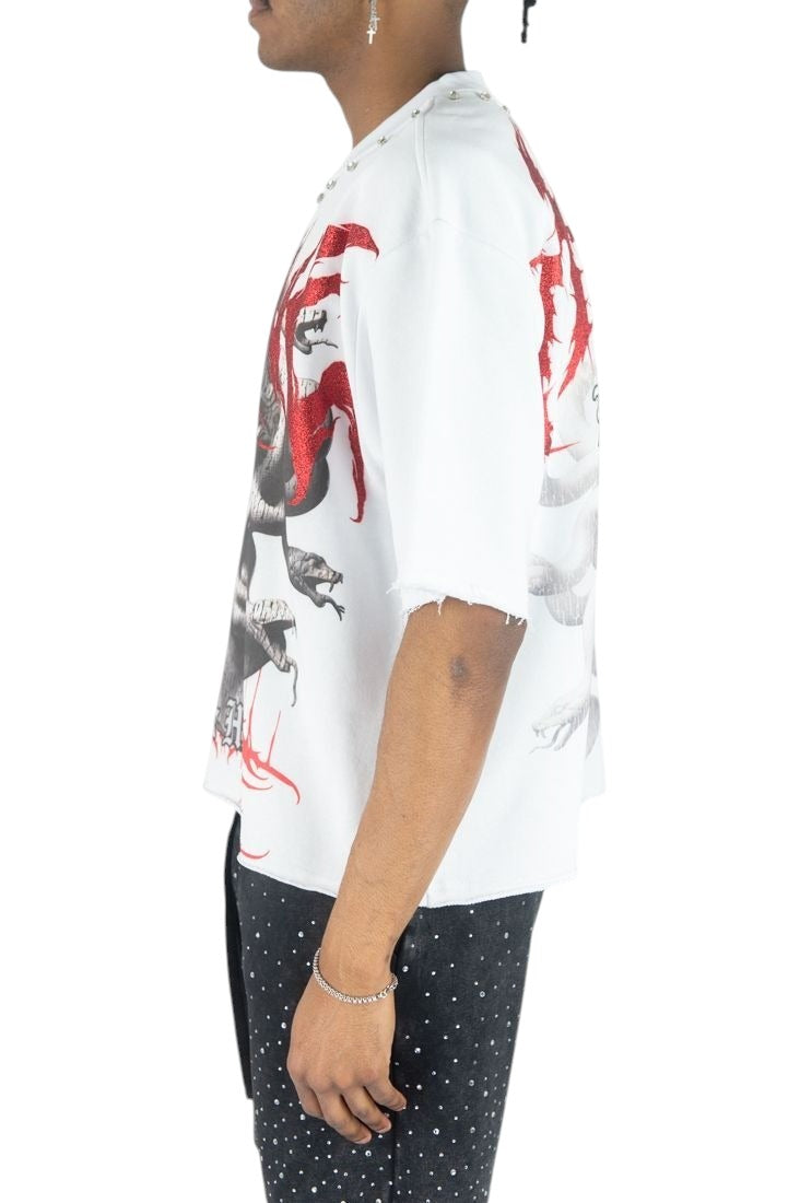 On Time Fashions Rebel Minds white heavyweight crop tee with red Medusa graphic and raw hem on a male model.