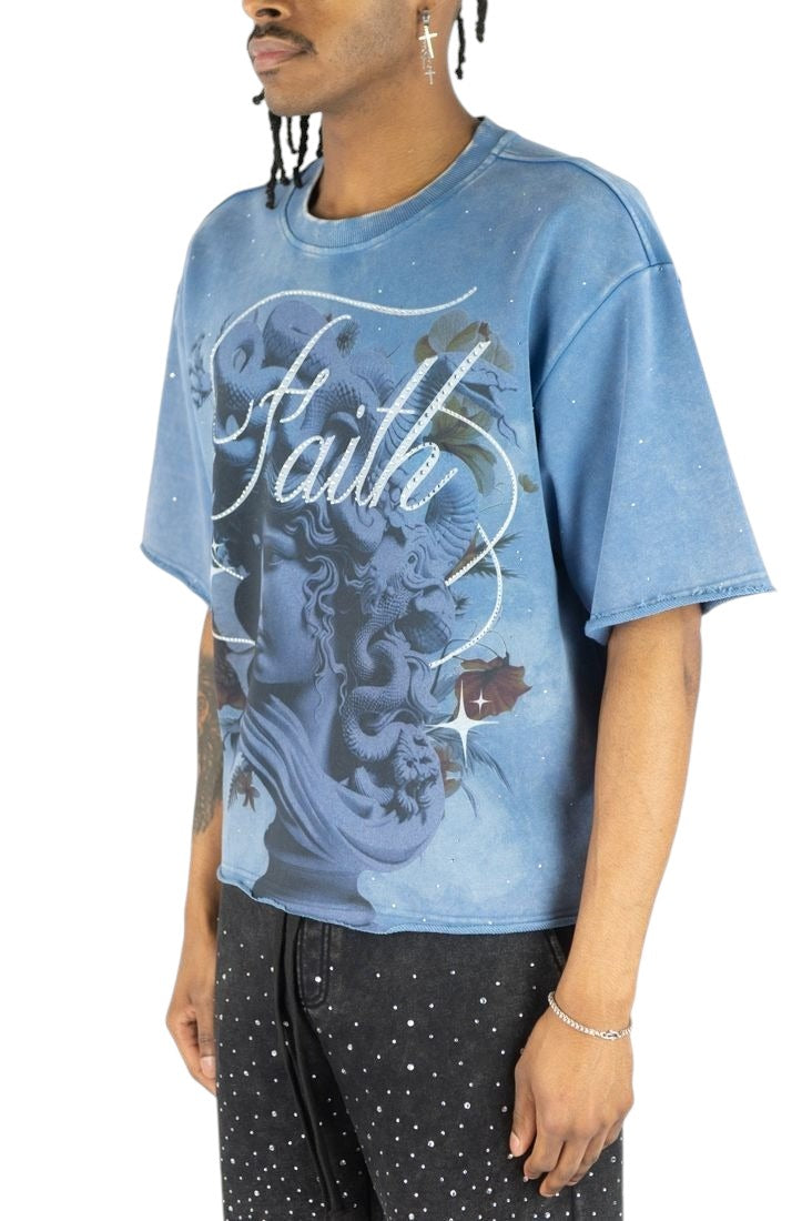 On Time Fashions Rebel Minds blue French terry crop tee with Medusa graphic and rhinestone Faith lettering.
