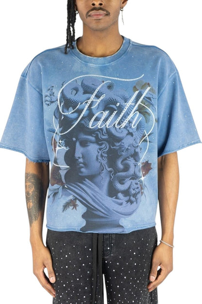 On Time Fashions Rebel Minds blue French terry crop tee with Medusa graphic and Faith lettering on a male model.