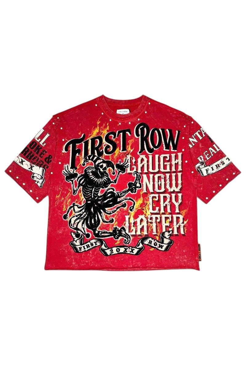 On Time Fashions red cropped tee with "Laugh Now Cry Later" graphic, skeleton jester, flames, and pearl stud details.