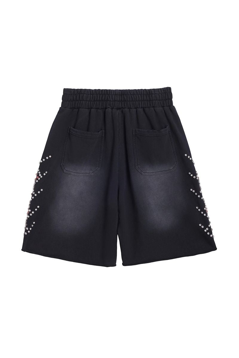 On Time Fashions black terry cloth shorts with rhinestone side detail and elastic waistband.