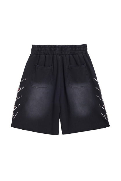 On Time Fashions black terry cloth shorts with rhinestone side detail and elastic waistband.