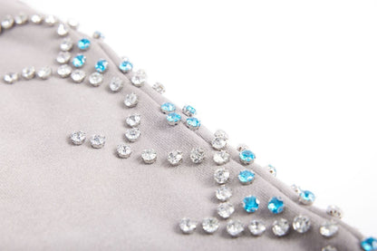 On Time Fashions grey terry cloth shorts with scattered clear and blue rhinestones on the side.