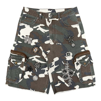 On Time Fashions Syndicate Eden camo denim jorts with floral and star crystal embellishments and side cargo pockets.