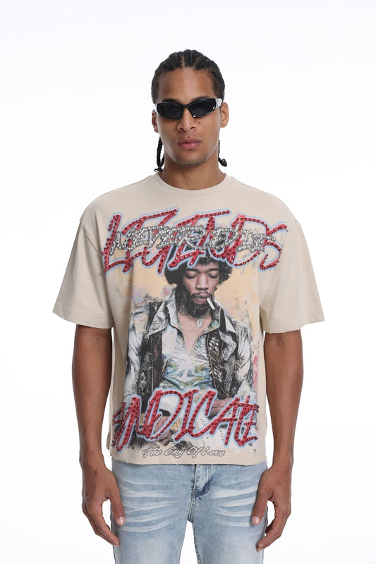 On Time Fashions beige graphic t-shirt featuring a Jimi Hendrix print with red and silver rhinestone embellishments.