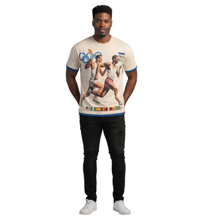 On Time Fashions Syndicate Olympic tee in cream with vintage runner graphic, blue trim, and black distressed jeans.