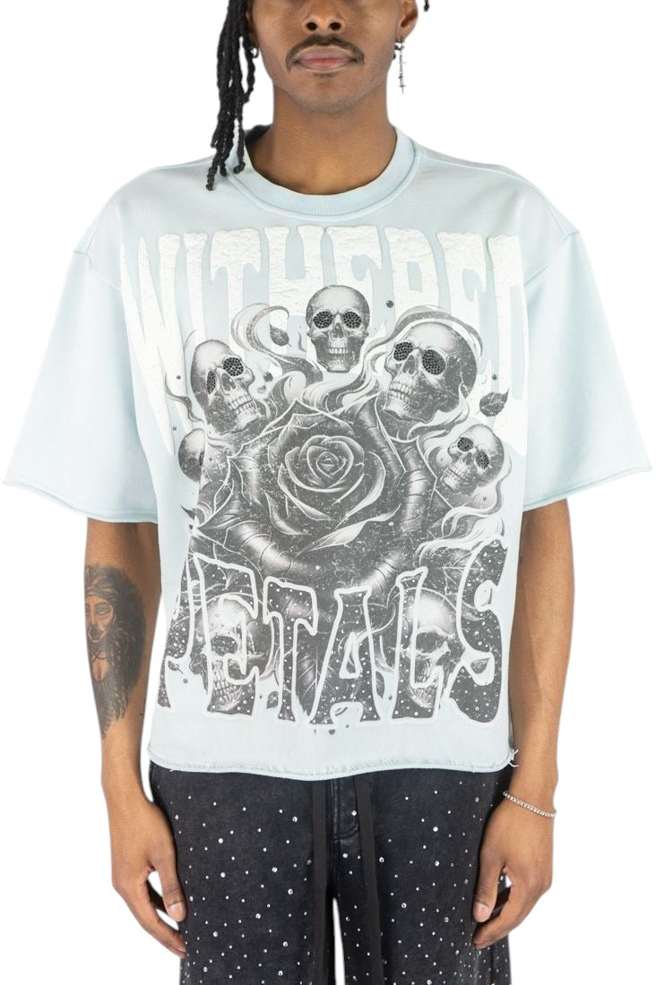On Time Fashions light blue crop tee with skull and rose graphic, rhinestone accents, and raised lettering.