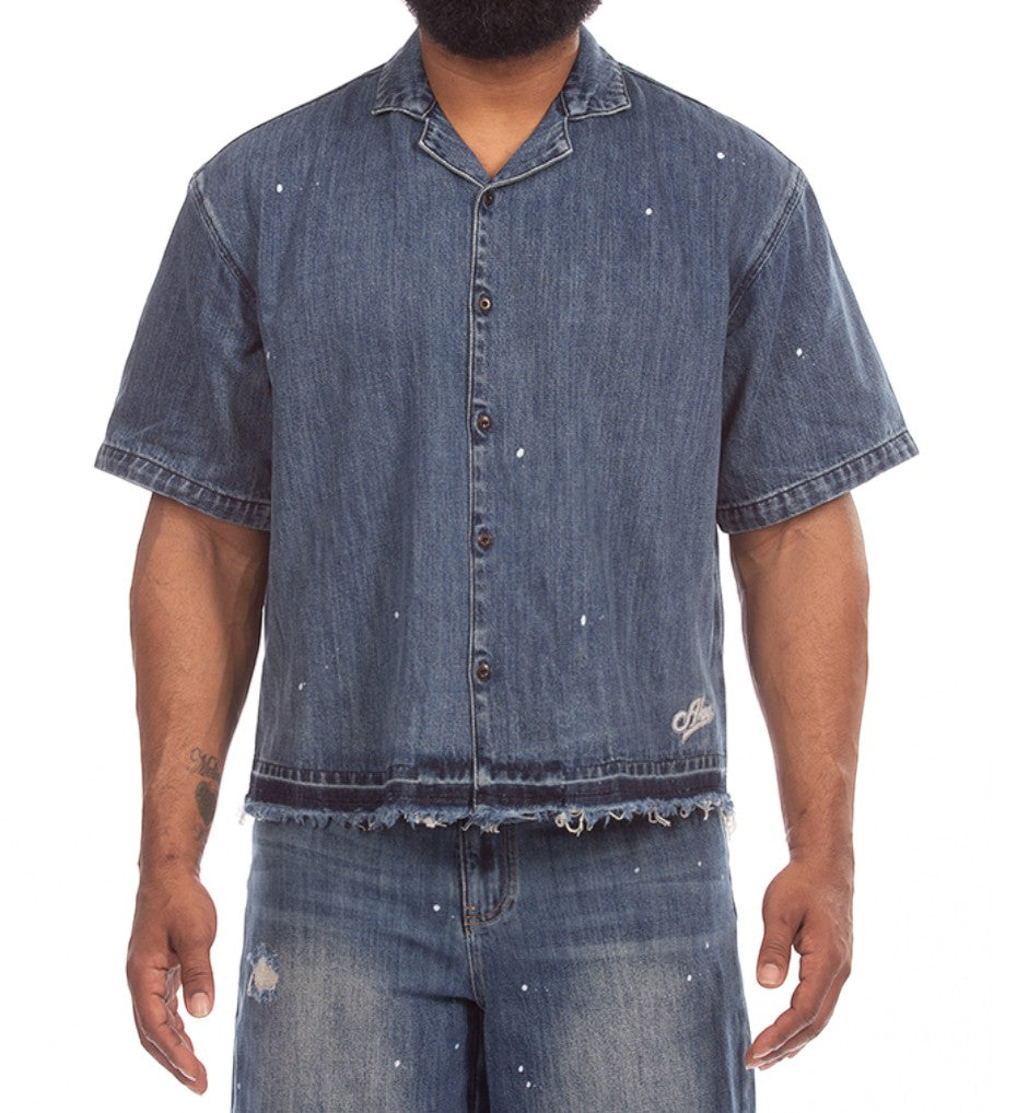 On Time Fashions Akoo SS Woven denim shirt with paint splatter, raw frayed hem and button front.