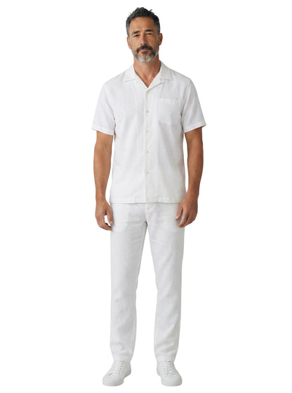 On Time Fashions Bagazio solid white short sleeve walking pants set with button-up shirt and matching bottoms.