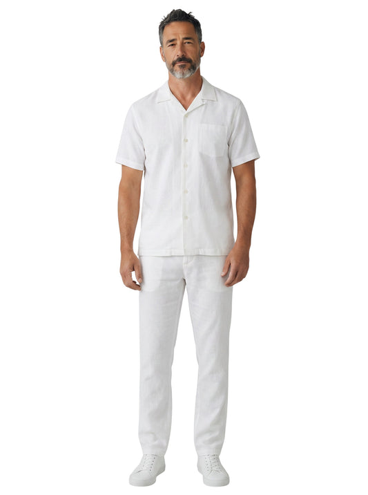 On Time Fashions Bagazio solid white short sleeve walking pants set with button-up shirt and matching bottoms.