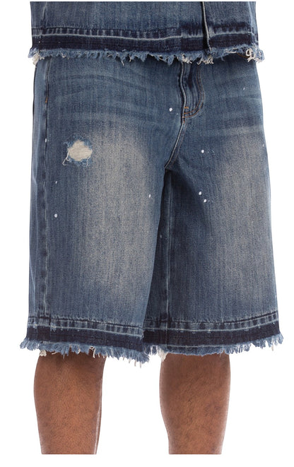 On Time Fashions Montgomery Short: 100% cotton denim shorts with distressed details, paint splatter, and frayed hem.