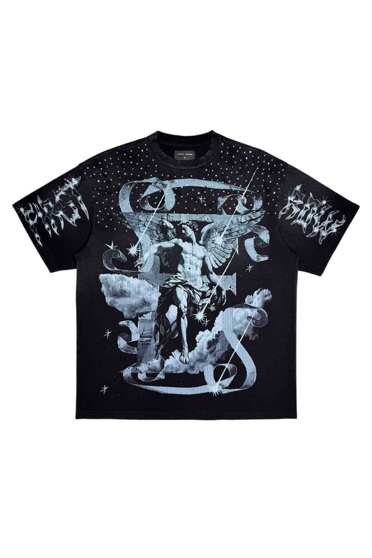 On Time Fashions black cotton tee with a celestial graphic featuring an angel, clouds, stars, and distressed text. Embellished with rhinestones on the shoulders and neckline.
