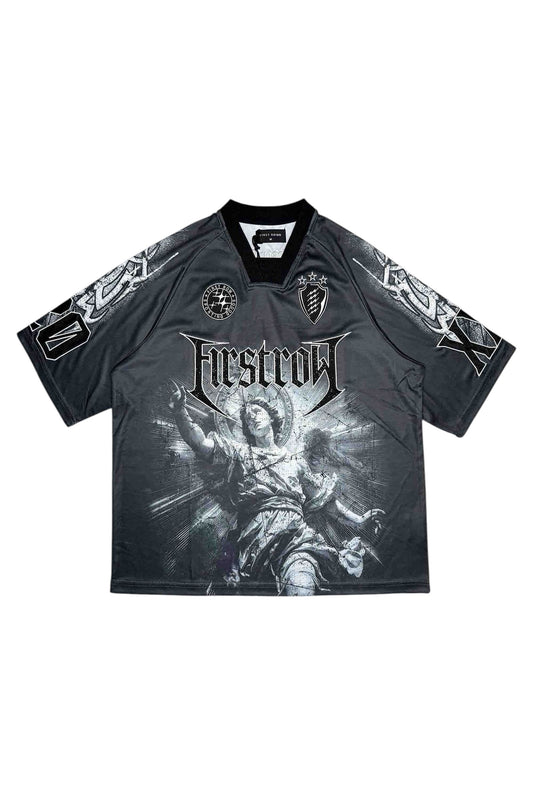 On Time Fashions black short sleeve sports jersey with a distressed graphic print of an angel and the 'First Row' logo.