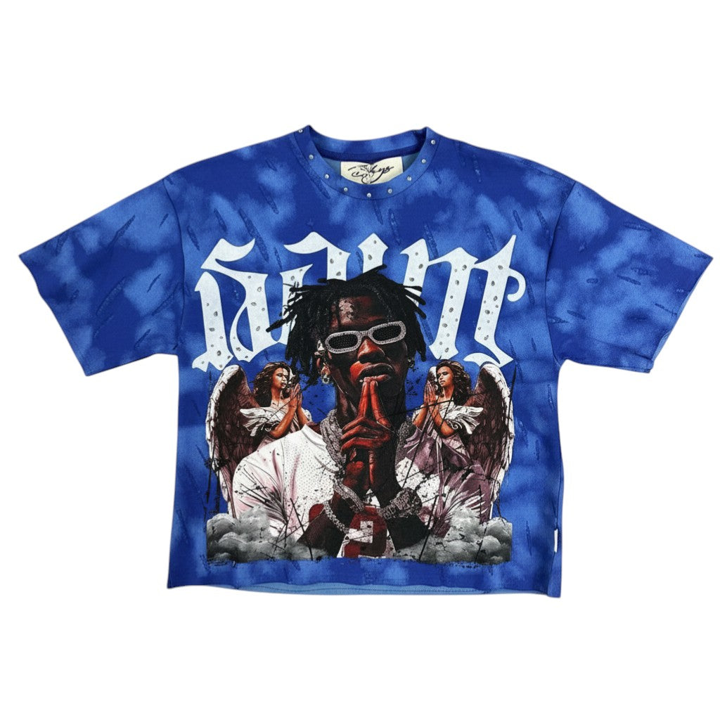 On Time Fashions blue tie-dye cropped tee with graphic print of a rapper and angels, studded neckline.