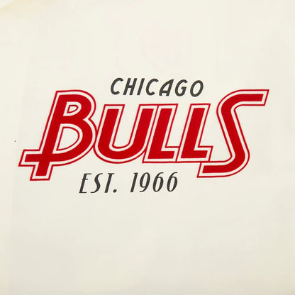 On Time Fashions Pro Standard Chicago Bulls Paradise Button Down Camp Shirt. Features bold red and white 'Bulls Est. 1966' graphic on a cream background.