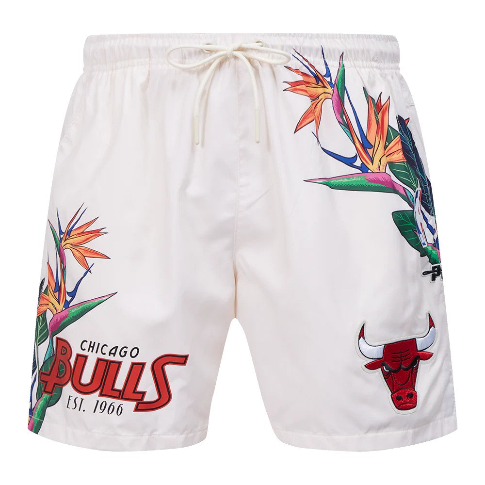 On Time Fashions white woven shorts with Chicago Bulls logo and tropical bird of paradise floral print.