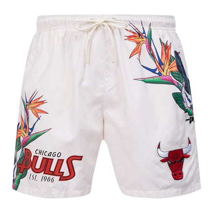 On Time Fashions white woven shorts with Chicago Bulls logo and tropical bird of paradise floral print.