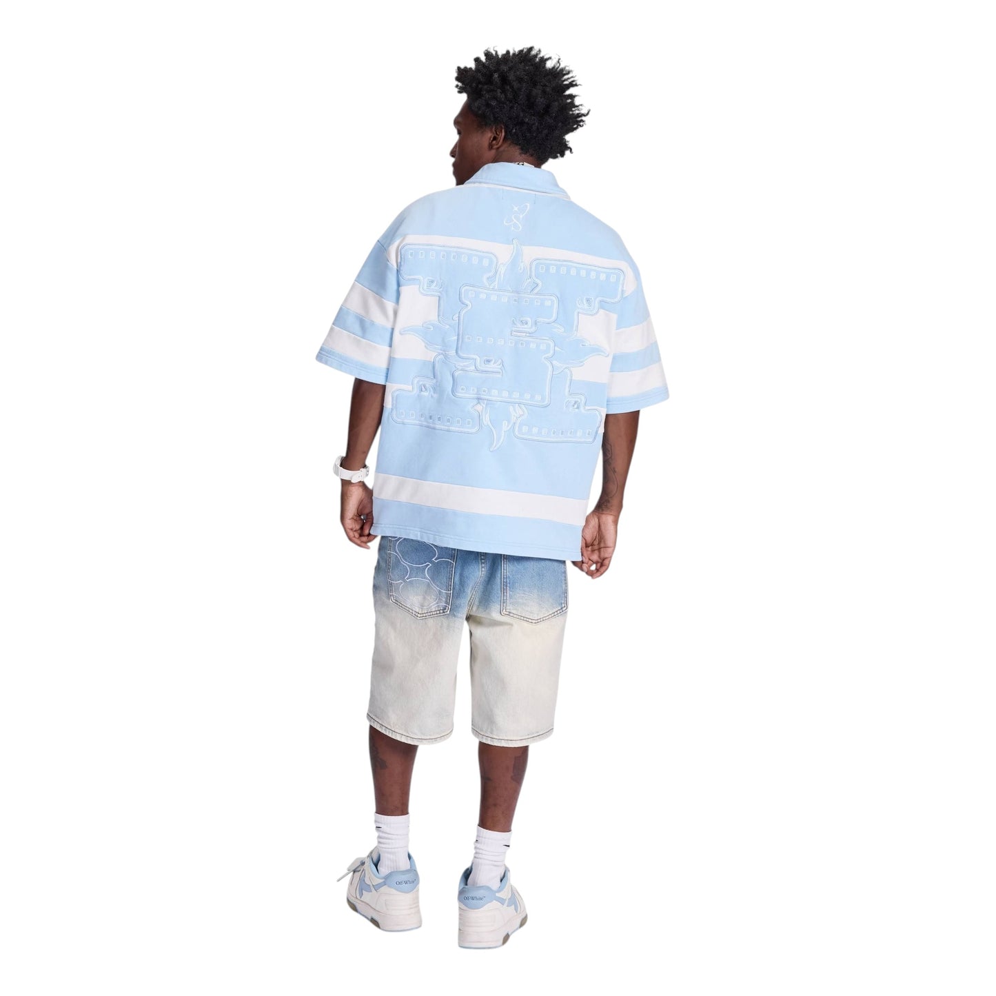 On Time Fashions light blue and white striped short-sleeve collared shirt with graphic detail, paired with light wash denim shorts with gradient effect.