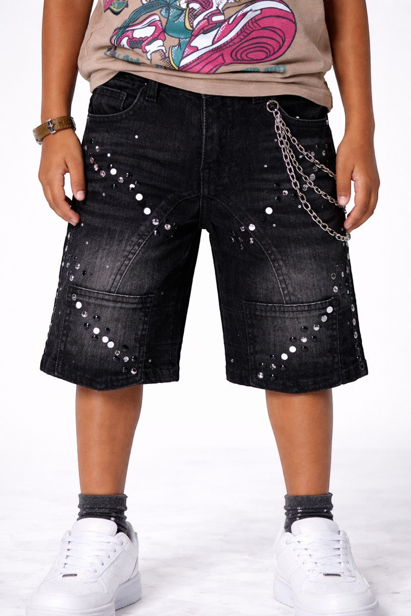 On Time Fashions black denim shorts for kids, embellished with rhinestones and featuring a detachable chain. Designer wash with rip and repair details.