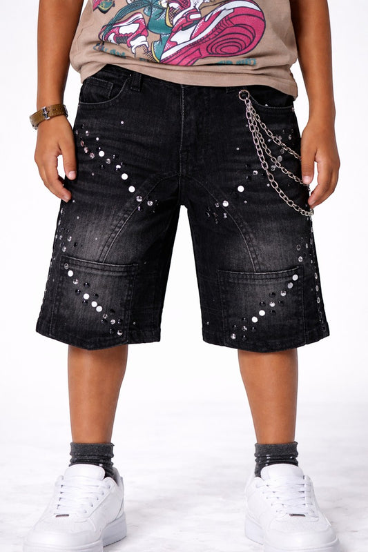 On Time Fashions black denim shorts for kids, embellished with rhinestones and featuring a detachable chain. Designer wash with rip and repair details.