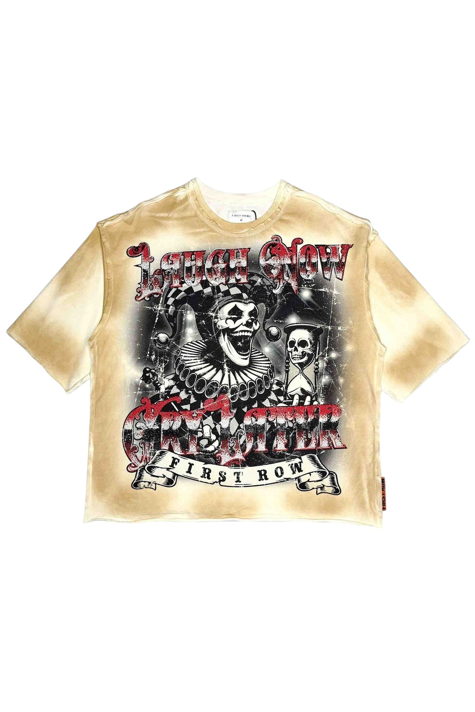 On Time Fashions cropped t-shirt with a distressed tie-dye effect in cream, featuring a jester and skulls graphic with 'Laugh Now Cry Later' text.