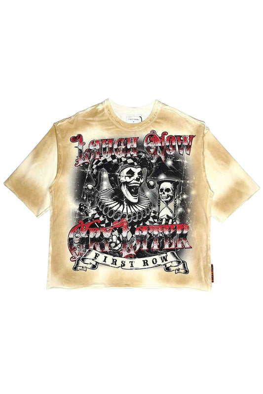 On Time Fashions cropped t-shirt with a distressed tie-dye effect in cream, featuring a jester and skulls graphic with 'Laugh Now Cry Later' text.