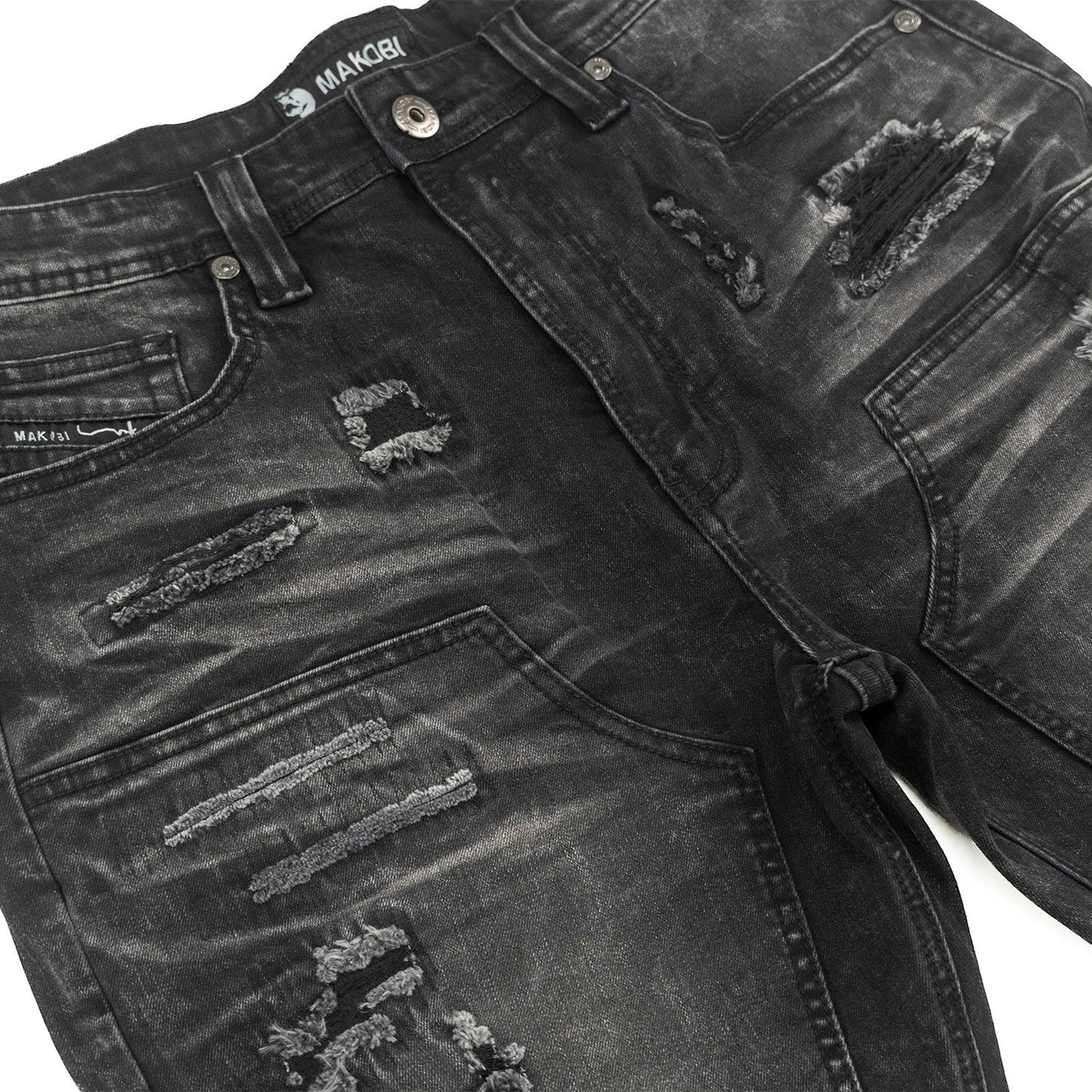 On Time Fashions Makobi Prego black distressed denim shorts with ripped detailing.