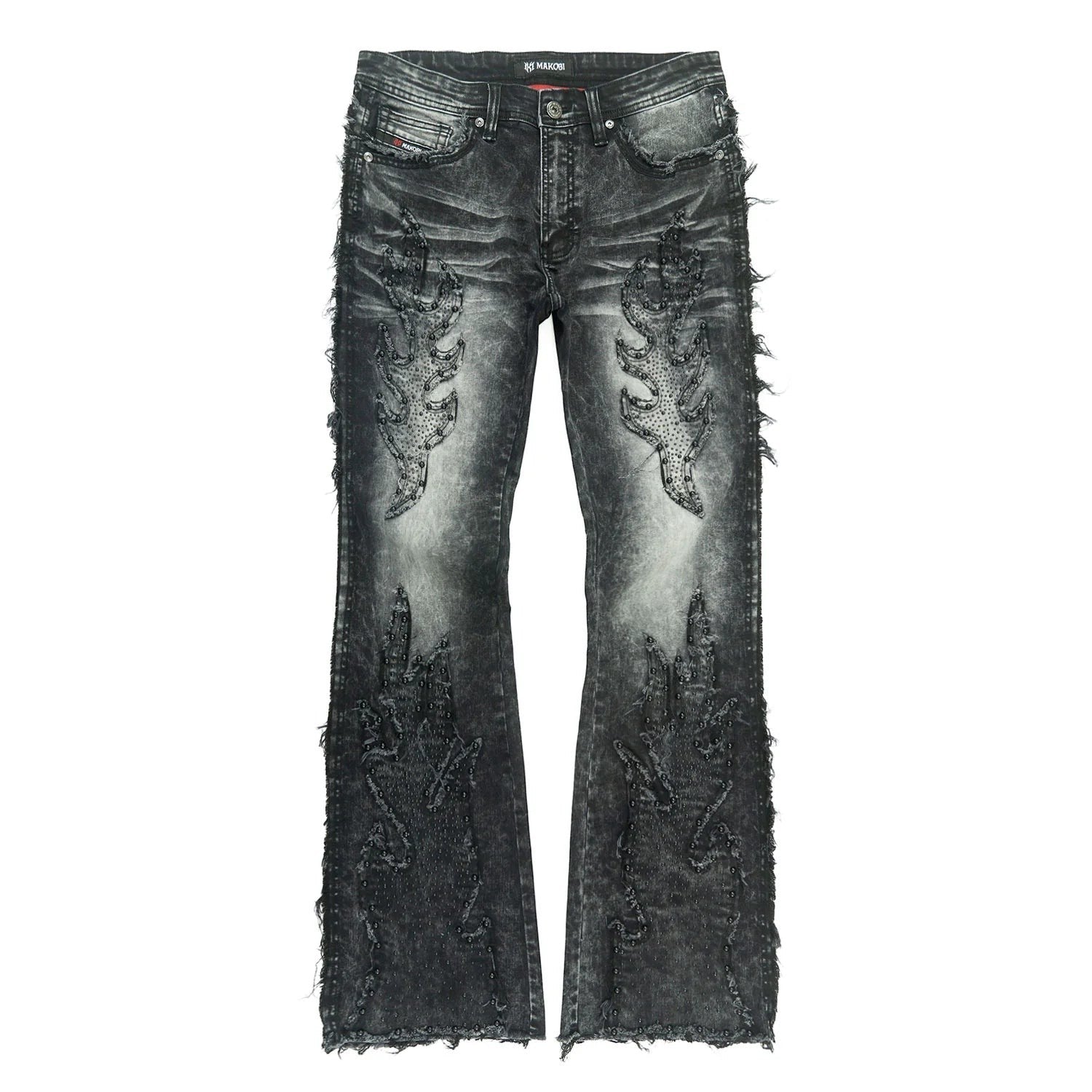 On Time Fashions Makobi Tesoro stacked jeans in distressed black denim with flame-like embellishments and frayed hems.