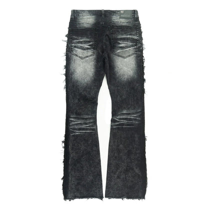 On Time Fashions Makobi Tesoro stacked jeans in black denim with distressed details and frayed hems.