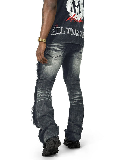 On Time Fashions Makobi Tesoro stacked jeans in charcoal grey denim with distressed details and frayed hems.