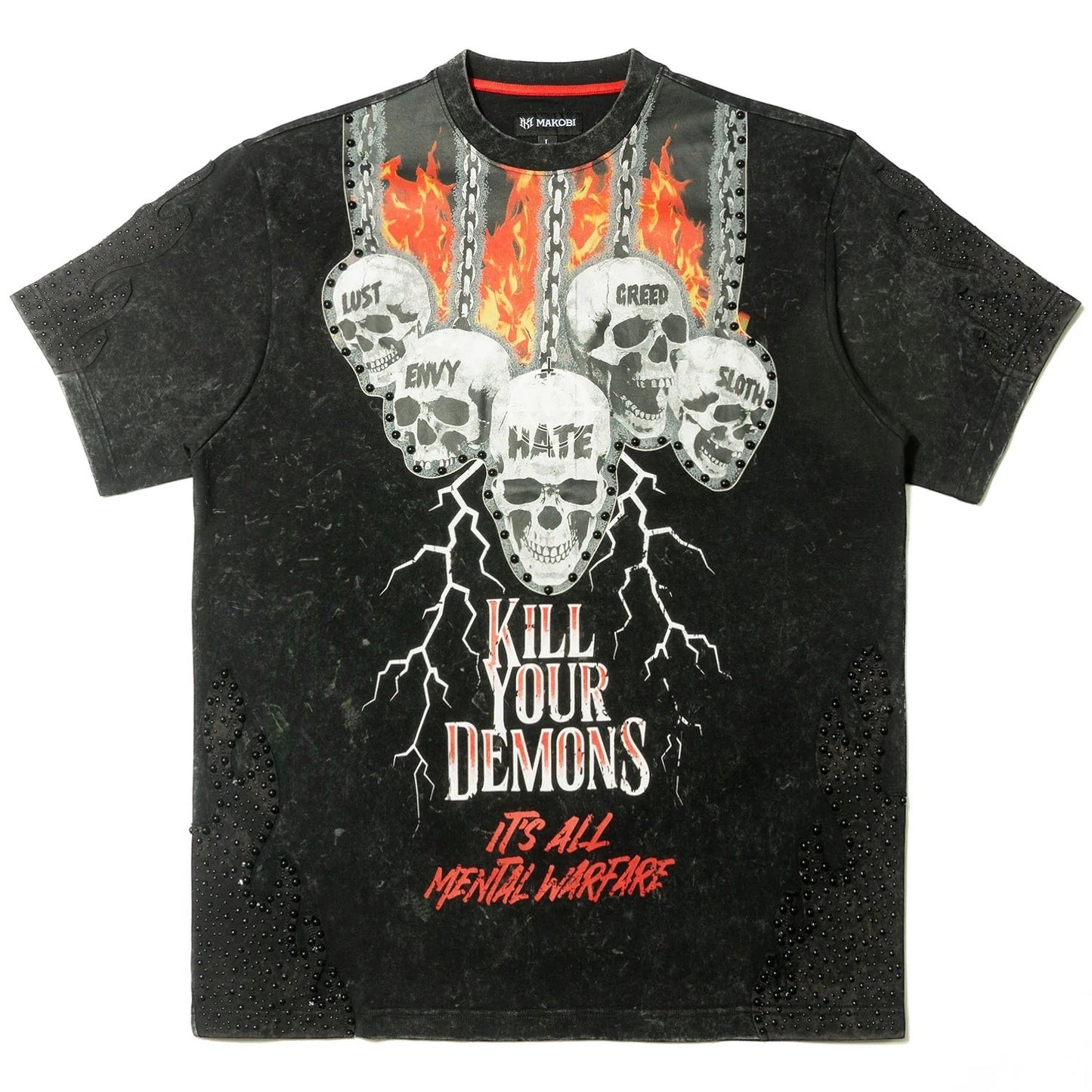 On Time Fashions Makobi Tesoro Tee, black mineral wash cotton with graphic print of skulls, flames, and lightning. Features text "KILL YOUR DEMONS" and "IT'S ALL MENTAL WARFARE".