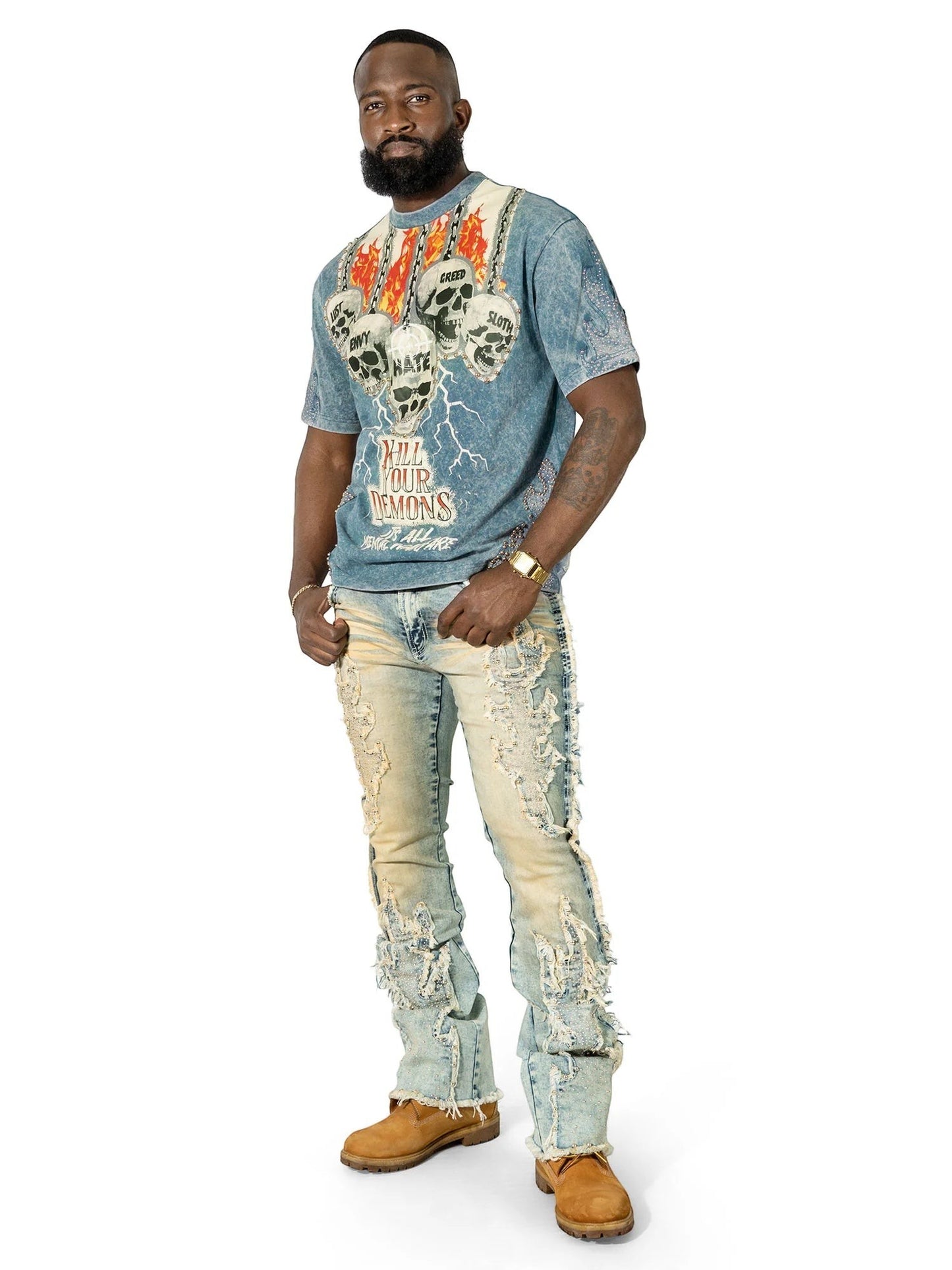 On Time Fashions Makobi Tesoro Tee with a distressed blue wash, featuring a skull graphic and "Kill Your Demons" text. Paired with ripped light wash jeans.