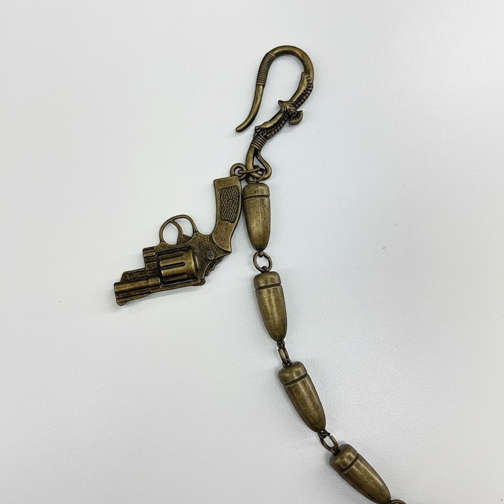 On Time Fashions Drunz Bullet Link Pistol Chain with antique brass finish and detailed gun charm.