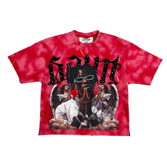 On Time Fashions red tie-dye Saint cropped tee with graphic print of a rapper and angels. French terry fabric.