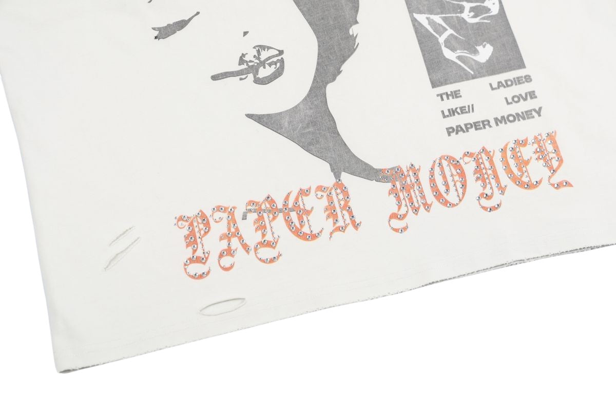 On Time Fashions white cotton cutoff t-shirt with distressed details and rhinestone-embellished Paper Money graphic.