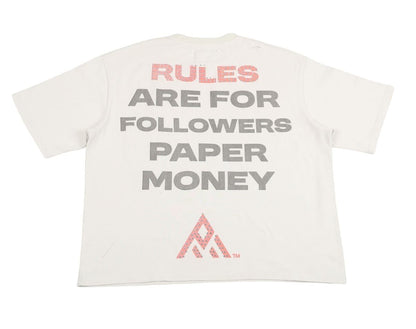 On Time Fashions white cotton t-shirt with 'RULES ARE FOR FOLLOWERS PAPER MONEY' graphic print and a pink geometric logo.