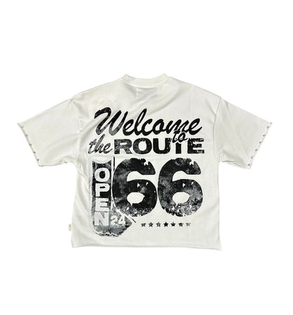 On Time Fashions white cropped t-shirt with distressed Route 66 graphic and raw hem.