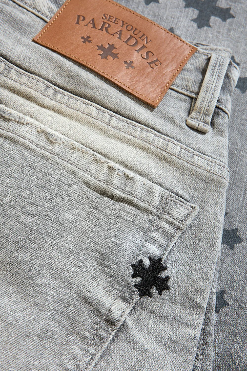 See You In Paradise Forbidden Fruit Stacked Skinny Denim from On Time Fashions – Jeans by Jordan Craig, Birmingham AL’s 1 fashion store and premier destination for streetwear, suits, kids fashion, and big & tall