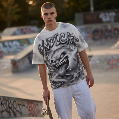 Syndicate Airbrush Ghost Tee from On Time Fashions – T-Shirt by Prestige Showroom, Birmingham AL’s 1 fashion store and premier destination for streetwear, suits, kids fashion, and big & tall