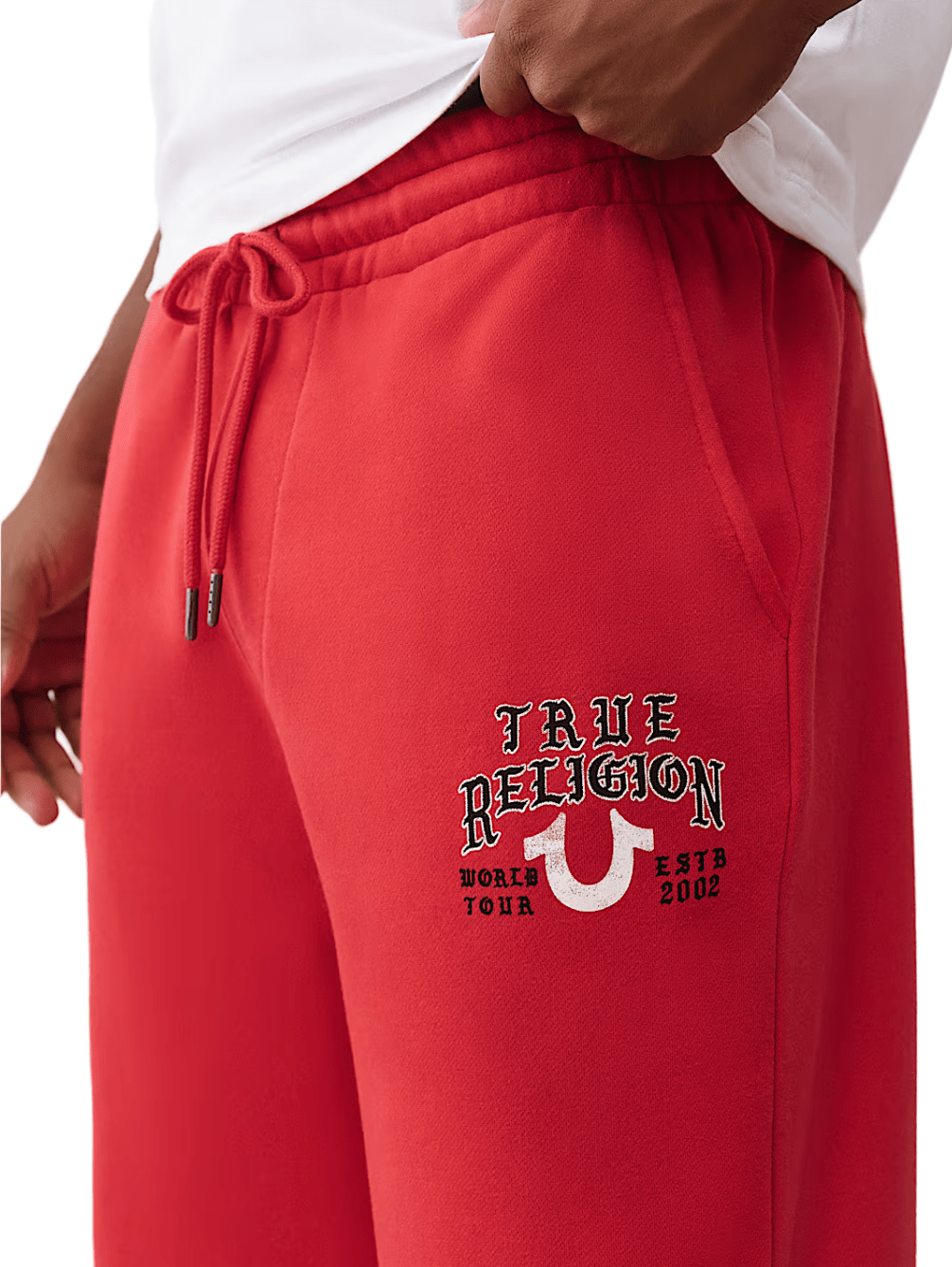 True Religion Logo Flag Baggy Sweatpant from On Time Fashions – Sweatpants/Joggers by True Religion, Birmingham AL’s 1 fashion store and premier destination for streetwear, suits, kids fashion, and big & tall
