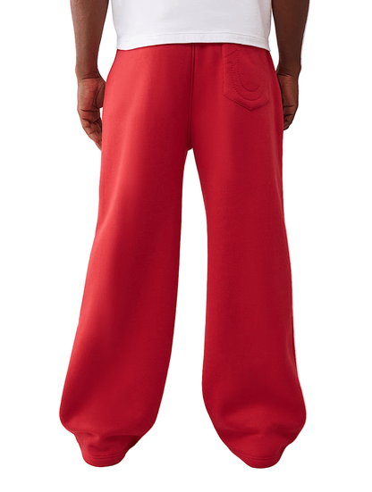 True Religion Logo Flag Baggy Sweatpant from On Time Fashions – Sweatpants/Joggers by True Religion, Birmingham AL’s 1 fashion store and premier destination for streetwear, suits, kids fashion, and big & tall