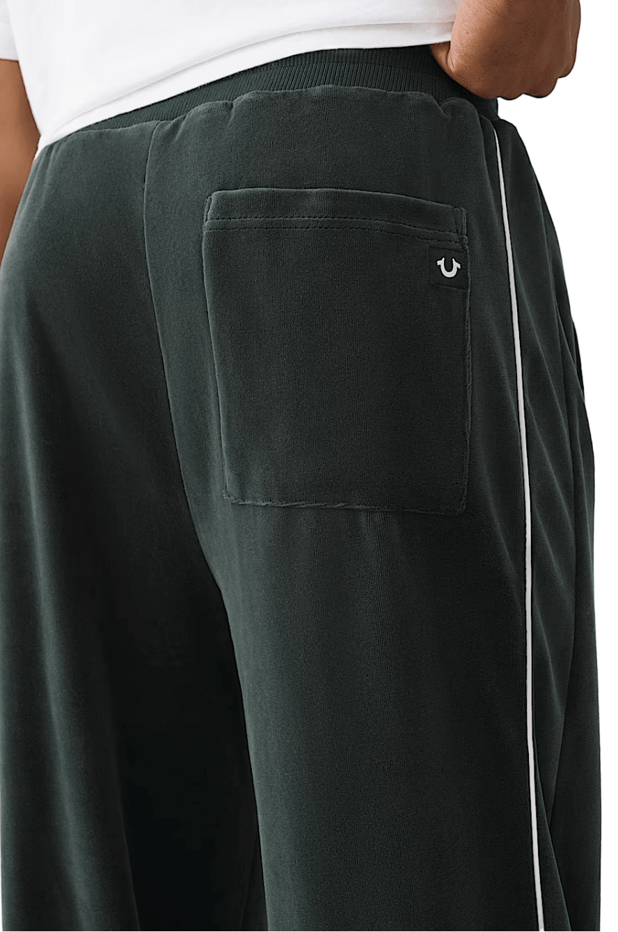 True Religion Logo Patch Velour Track Pants from On Time Fashions – Track Pants by True Religion, Birmingham AL’s 1 fashion store and premier destination for streetwear, suits, kids fashion, and big & tall