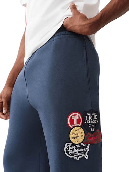 True Religion Vintage Patch Baggy Jogger from On Time Fashions – Sweatpants/Joggers by True Religion, Birmingham AL’s 1 fashion store and premier destination for streetwear, suits, kids fashion, and big & tall