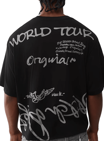 True Religion World Tour Script Boxy Tee from On Time Fashions – tee by True Religion, Birmingham AL’s 1 fashion store and premier destination for streetwear, suits, kids fashion, and big & tall