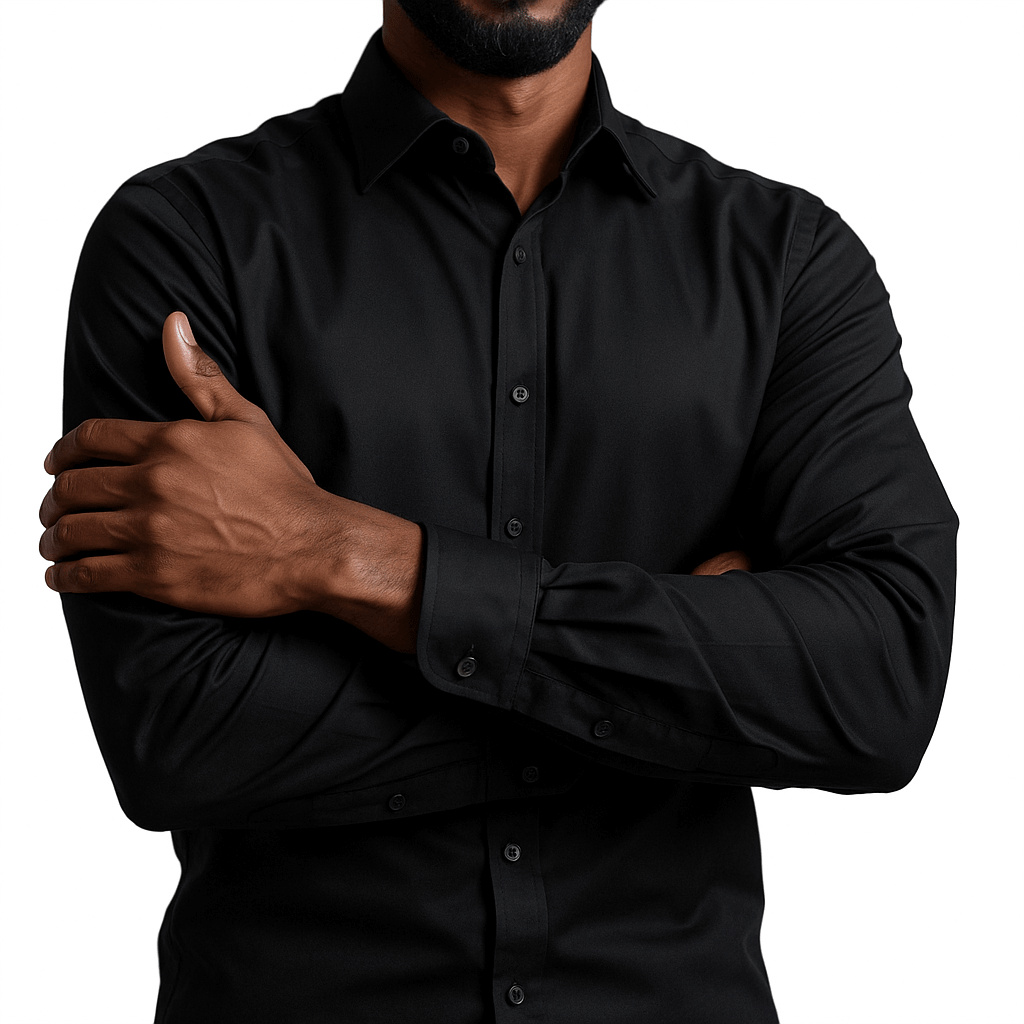 Black long-sleeve button-front shirt shown on a model with arms crossed.