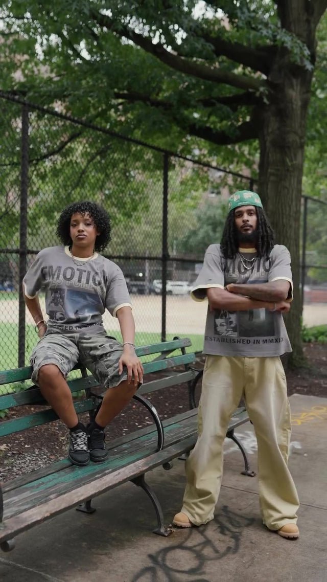 Models wearing Mixed Emotion graphic tees in the original campaign film.